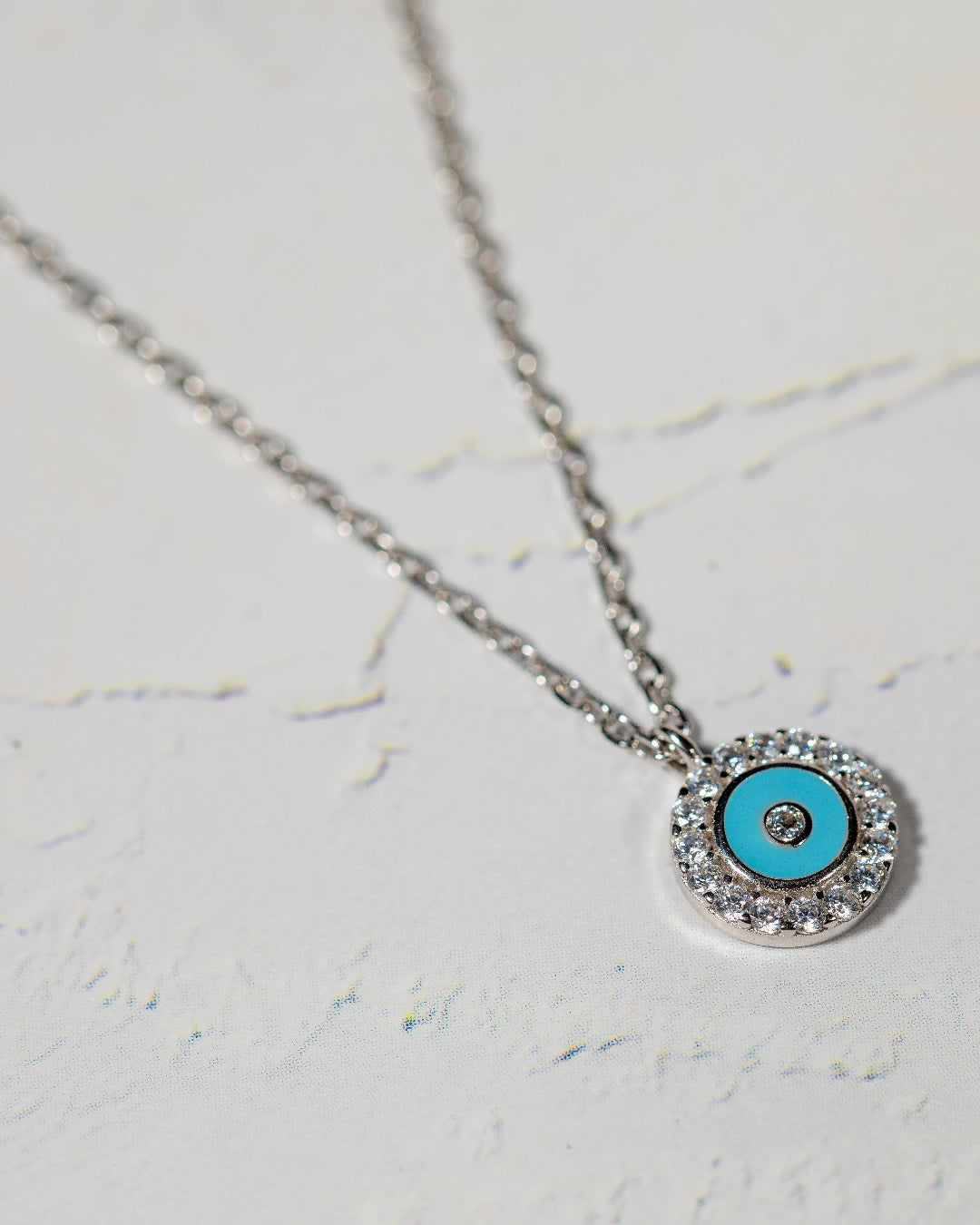 Round evil eye charm pendant necklace