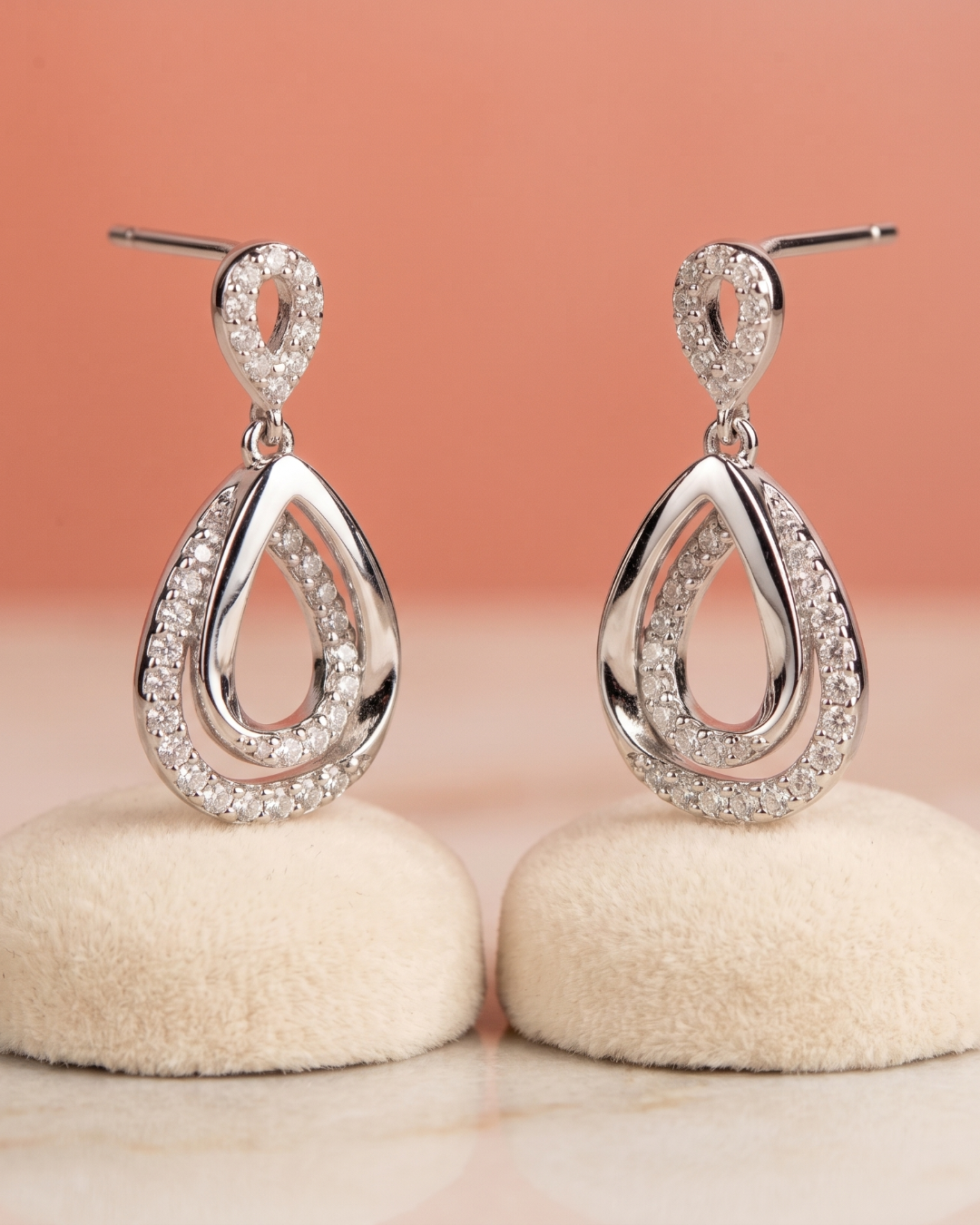 Rhodium finish drop earrings embellished with cubic zirconia