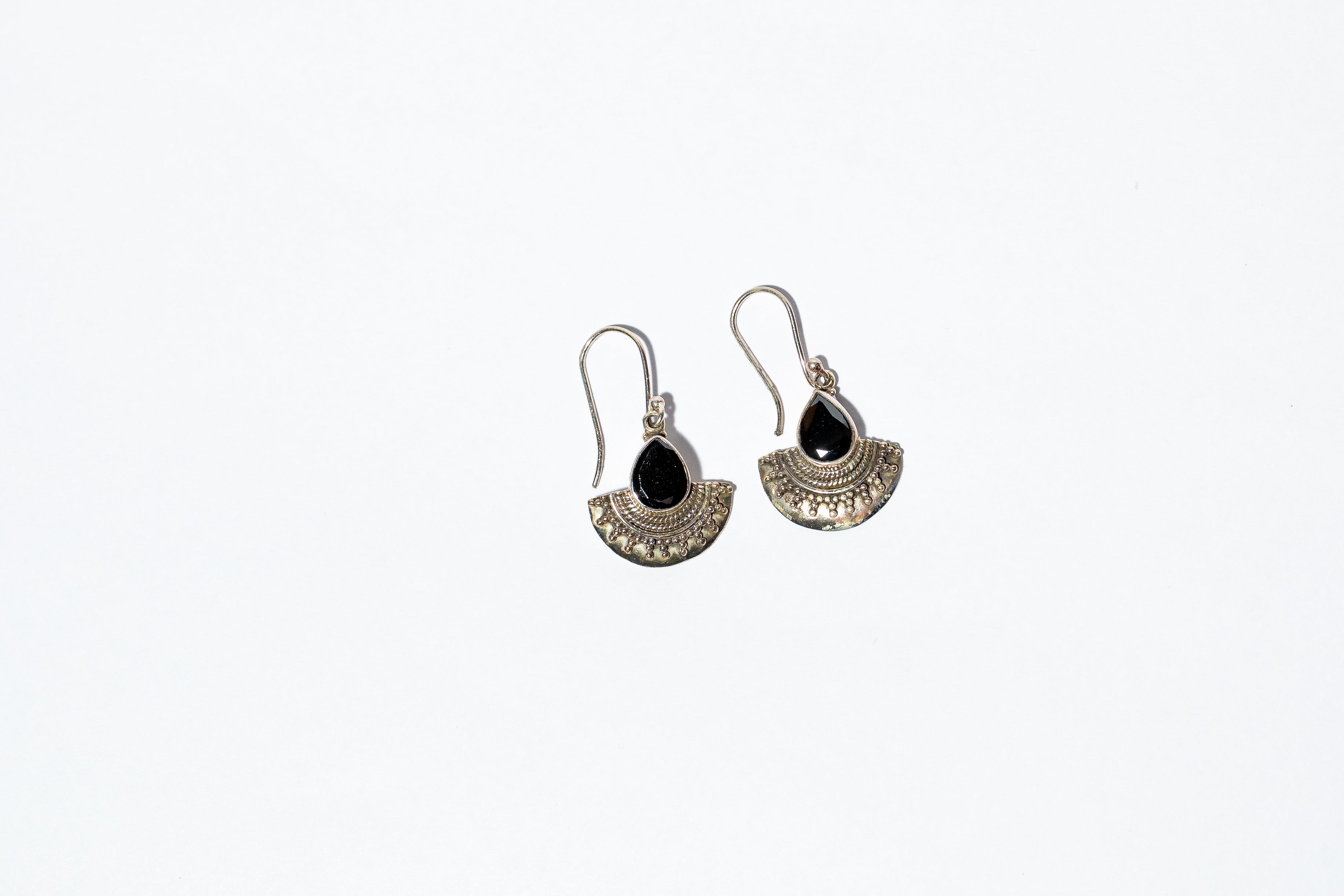 Handcrafted dangle earrings with black stone