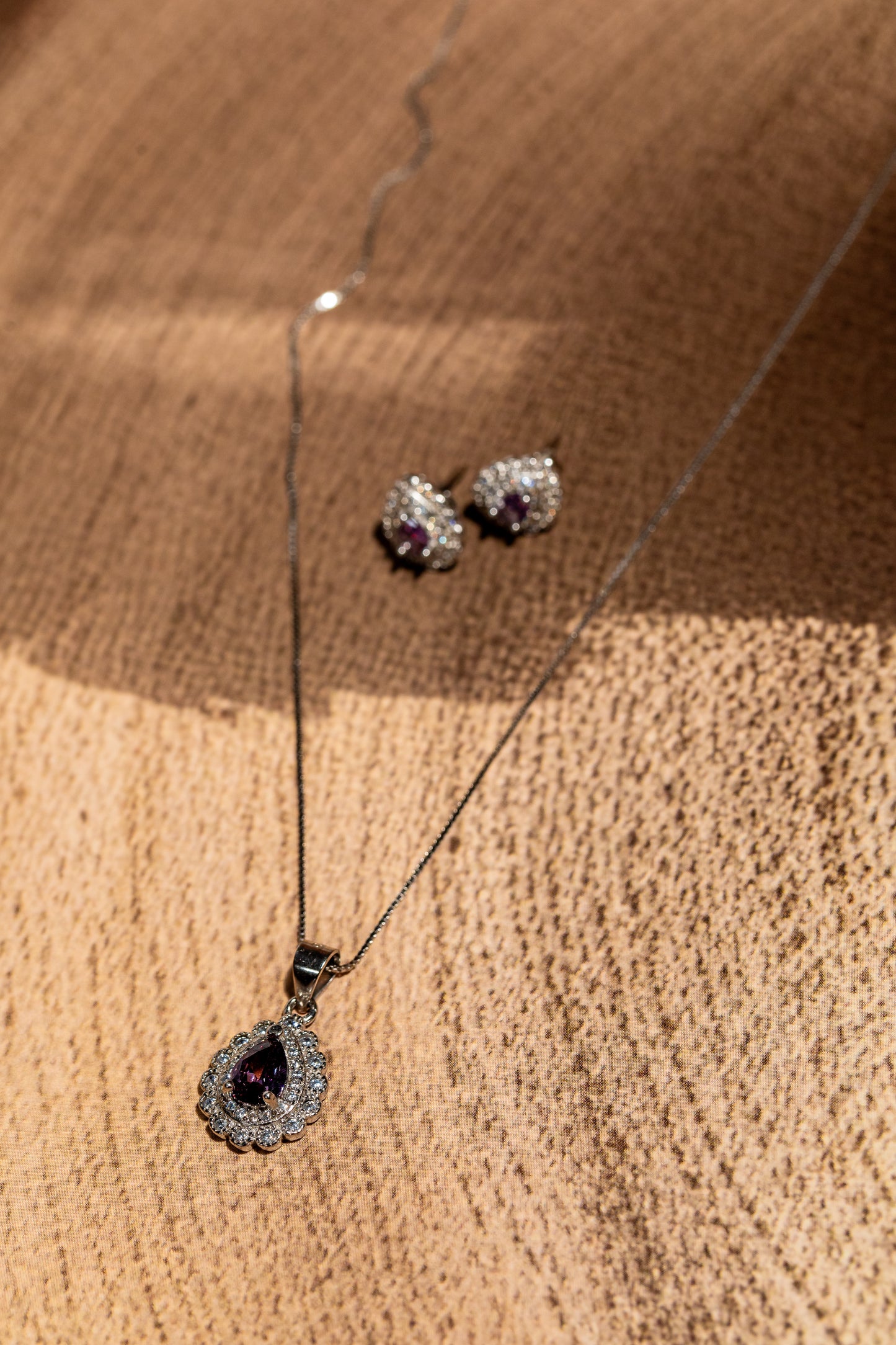 Sterling silver teardrop amethyst and cubic zirconia pendant and studs