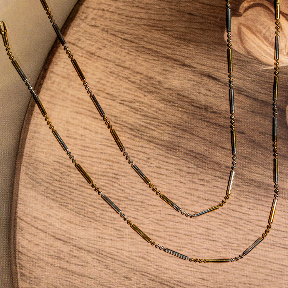 Two tone cylinder and bead link anklets in gold and silver tones