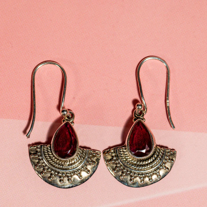 Handmade sterling silver dangle earrings with a red stone