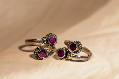 Handcrafted oxidised silver toe rings with magenta gemstones