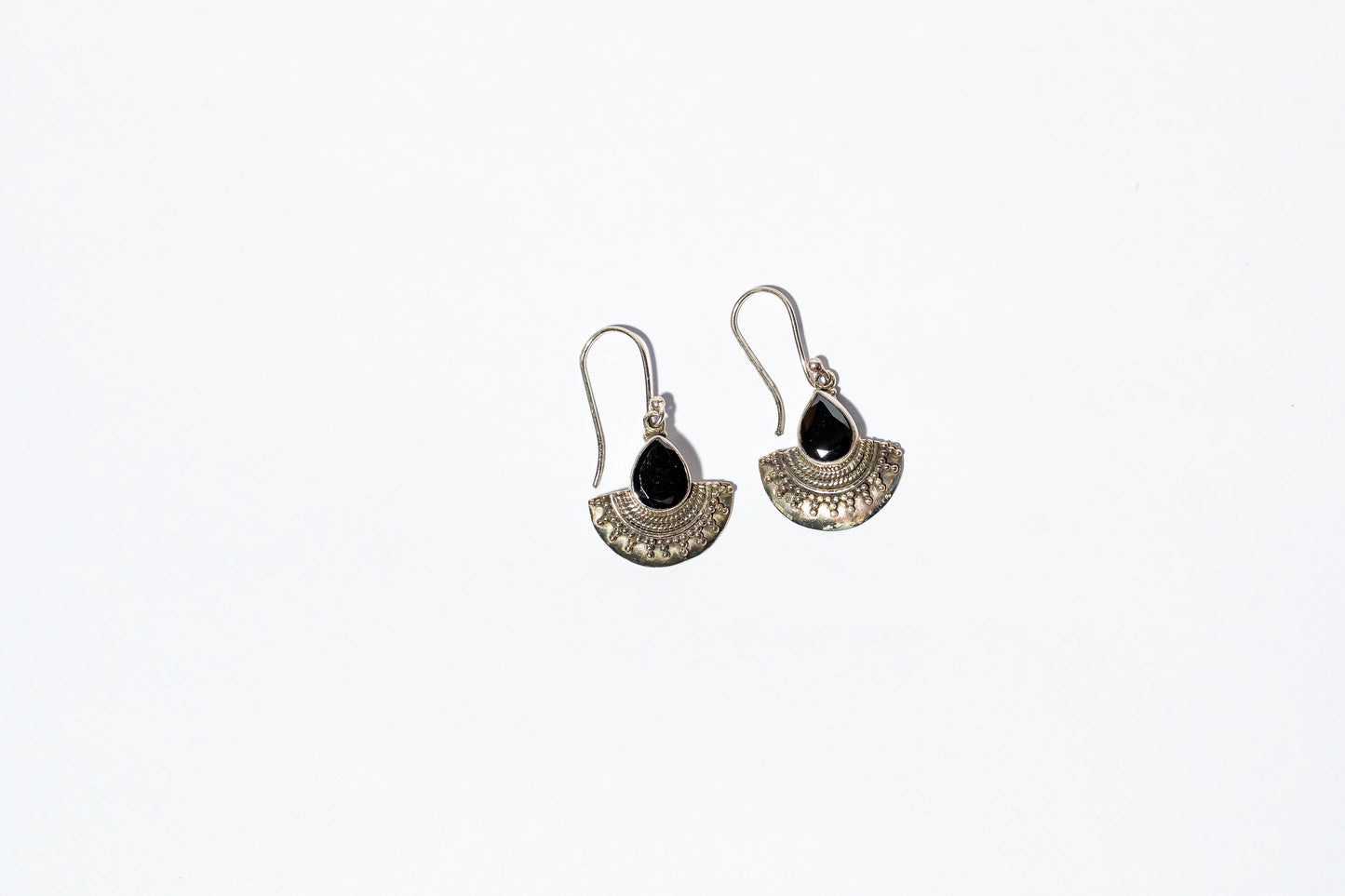 Handcrafted dangle earrings with black stone