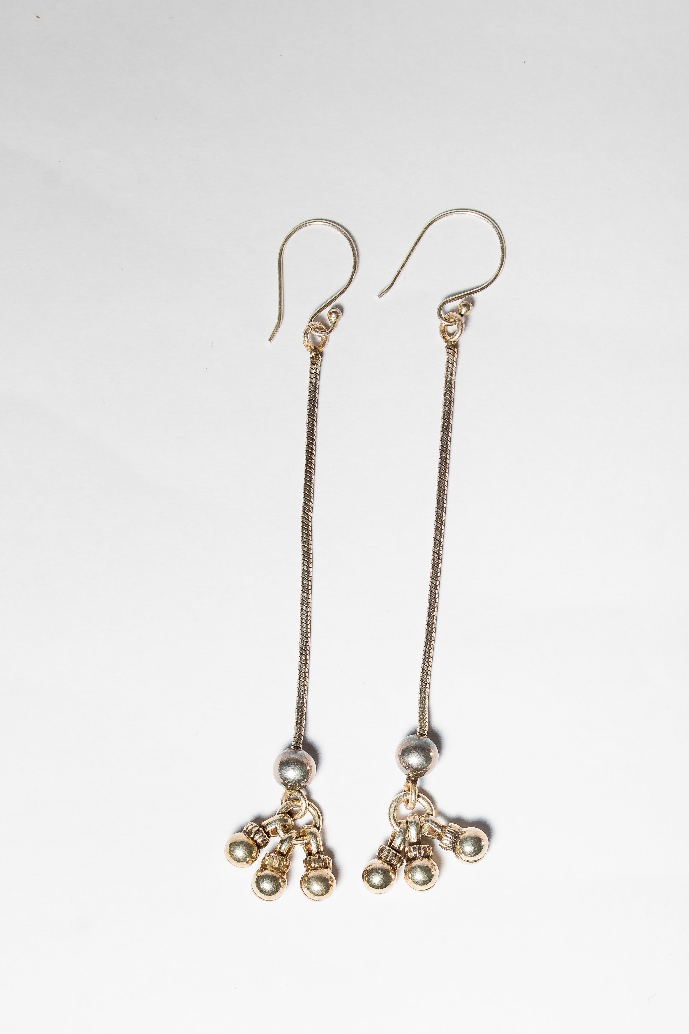 Long dangle drop earrings with small beaded accents