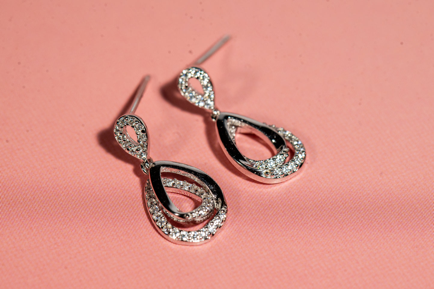 Rhodium finish drop earrings embellished with cubic zirconia