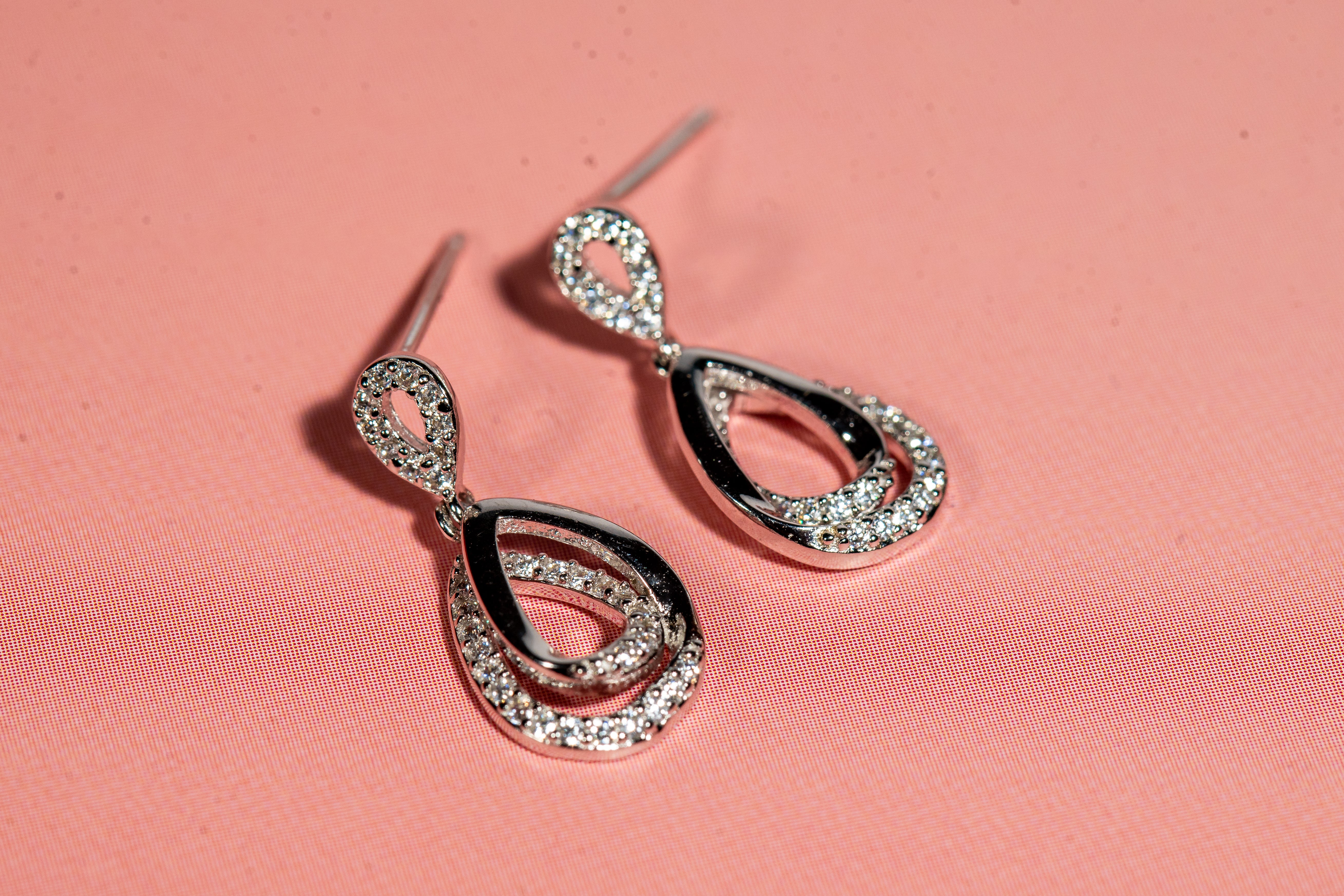 Rhodium finish drop earrings embellished with cubic zirconia