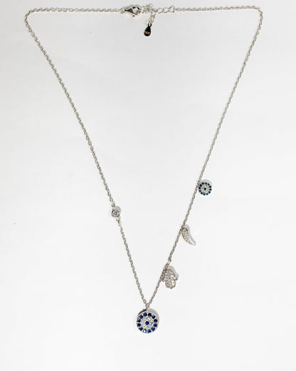 Sterling silver charm necklace featuring evil eye, hamsa hand and other luck charms