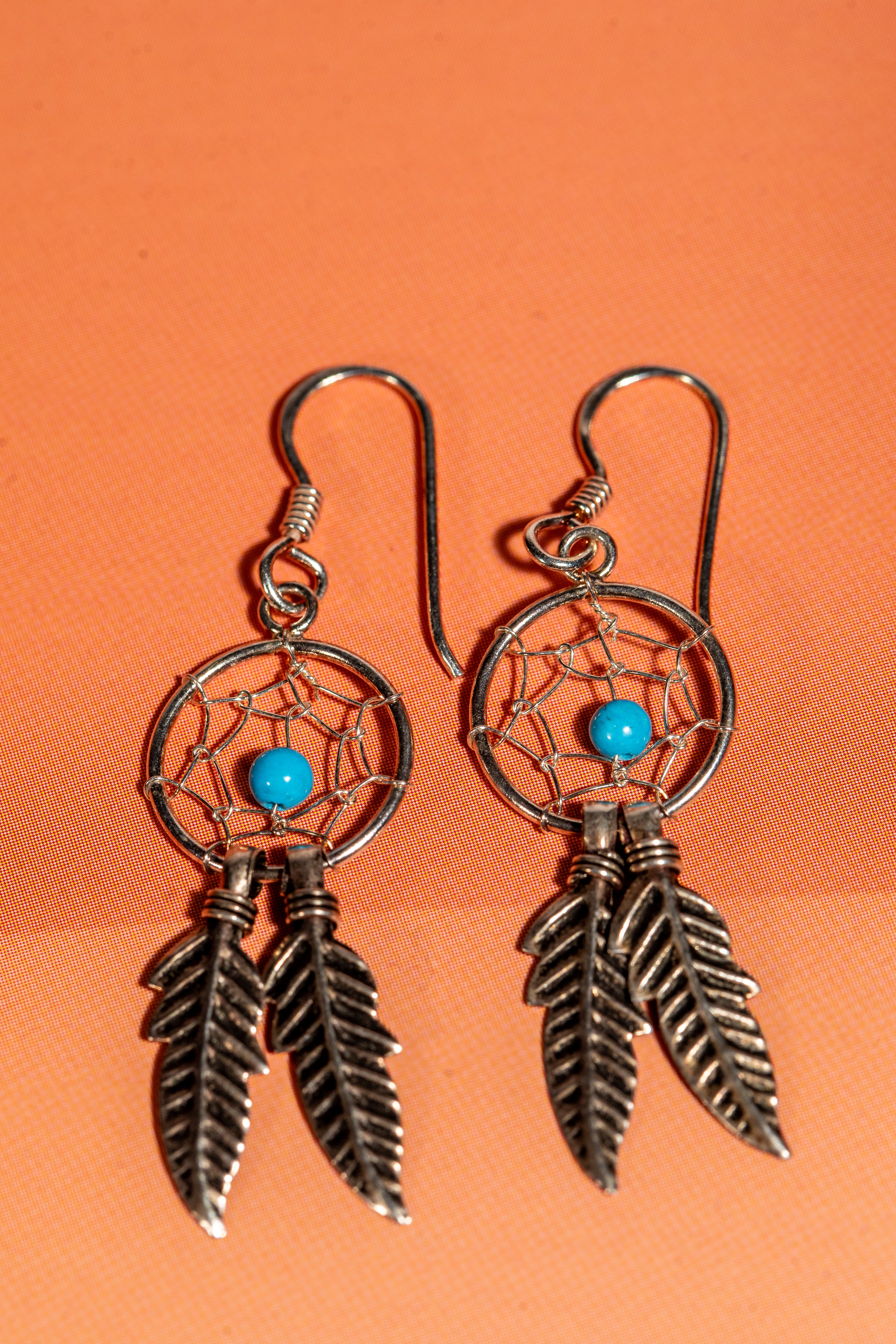 Sterling silver dream catcher dangle earrings with turquoise beads and feather charms