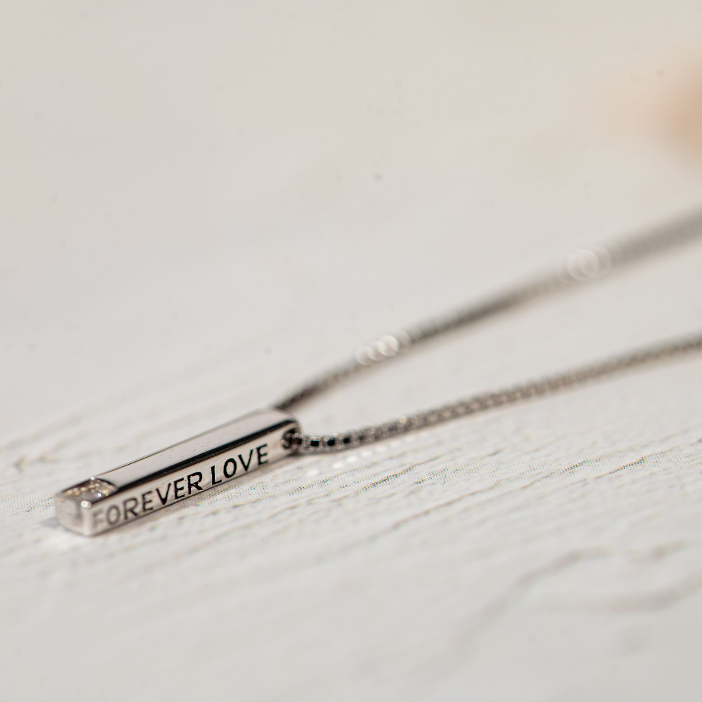 Bar pendant with cubic zirconia and engraved FOREVER LOVE on one side
